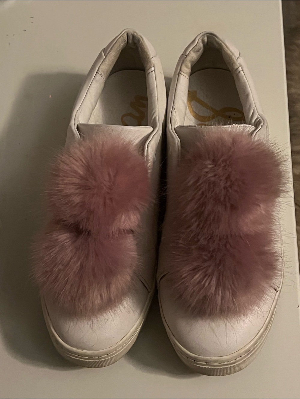 Women's Sam Edelman White Slip-On Sneakers with Pink Faux Fur Pom Accent